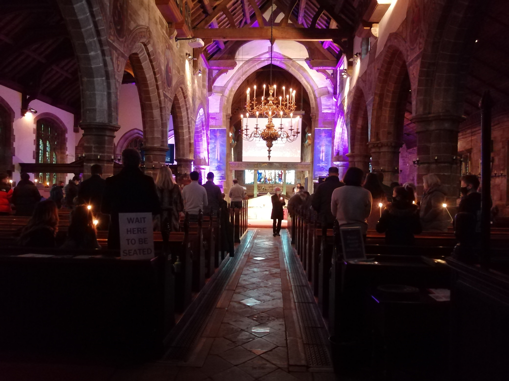 carols around the crib
